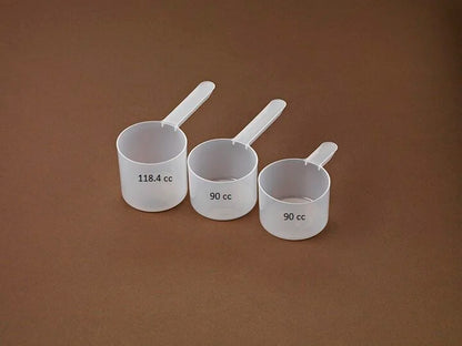 3 different types of plastic measuring spoons, with different measuring sizes.